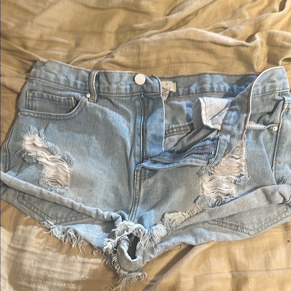 Distressed Light Blue Denim Shorts